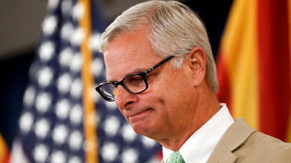 Rick Davis, spokesperson for Senator John McCain's family, reacts as he speaks to the media during a news conference.