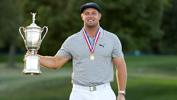 Major changes ... Bryson DeChambeau poses with the US Open trophy.