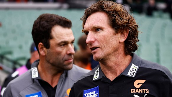 Giants assistant coaches and former Essendon teammates, Dean Solomon and James Hird.