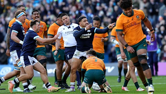 Sione Tuipulotu celebrates after scoring against the Wallabies in November.