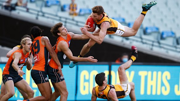 Tim O’Brien takes a ‘Superman’ grab for the ages in Hawthorn’s win over the Giants.