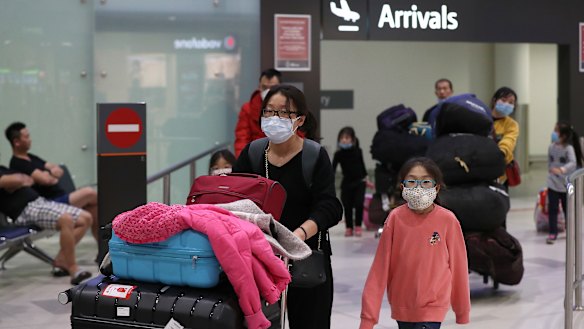 Passengers from China Southern Airlines flight CZ319 arrive at Perth International Airport  on Sunday.