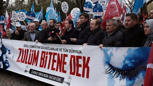 Turkish demonstrators in Ankara stage a protest demanding an end to mass detentions of Uighurs and other predominantly Muslim ethnic minorities in China.