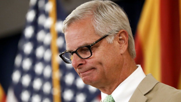 Rick Davis, spokesperson for Senator John McCain's family, reacts as he speaks to the media during a news conference.