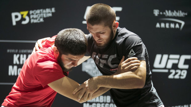 Training: Nurmagomedov (right) will want to turn the fight into a wrestle.