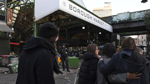 Police evacuate the nearby Borough Market, which was the scene of a terrorist attack in 2017.