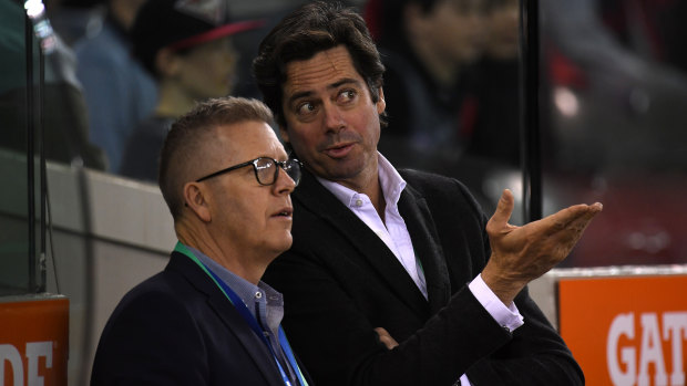 AFL boss Gillon McLachlan and Steve Hocking (left) are confident the nine rule changes will have a positive effect.