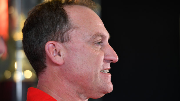 Whole new ball game: The new rules in the AFL pose a serious challenge for Sydney coach John Longmire.