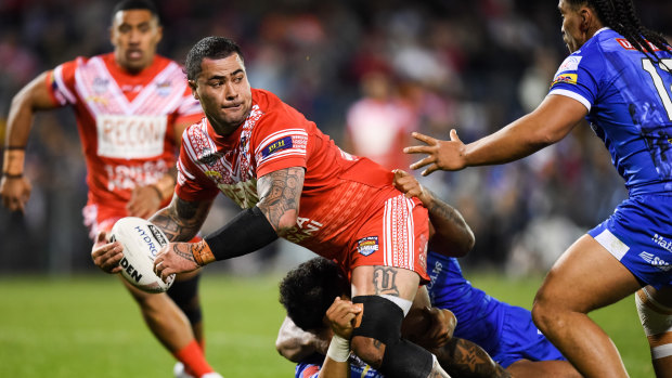 Proud: Andrew Fifita playing for Tonga against Samoa in last year's World Cup.