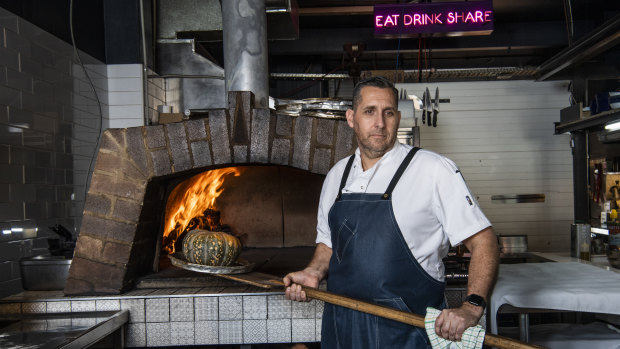 Restaurateur Attila Yilmaz struggles to pay his staff their full wage and still keep the restaurant open.