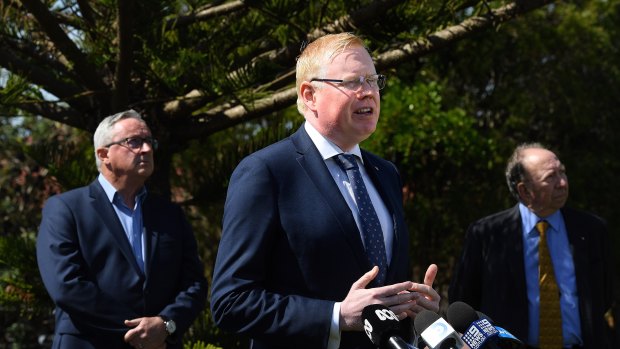 Kiama MP Gareth Ward, centre, was charged with sexual offences.