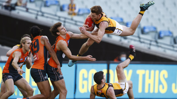 Tim O’Brien takes a ‘Superman’ grab for the ages in Hawthorn’s win over the Giants.