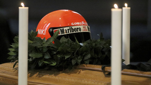 Farewell: Niki Lauda's racing helmet placed atop his coffin.