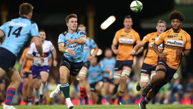 Harrison spinning the ball wide against the Brumbies in 2021.