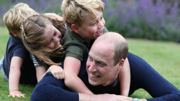 Prince William (right) plays with (from left) Prince Louis, Princess Charlotte and Prince George to mark both his birthday and Fathers Day. 
