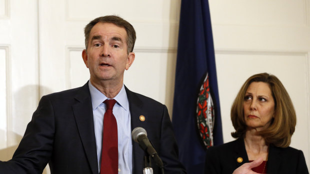 Virginia Governor Ralph Northam,  accompanied by his wife, Pam, is facing calls to resign after allegedly posing in "blackface" while in college.