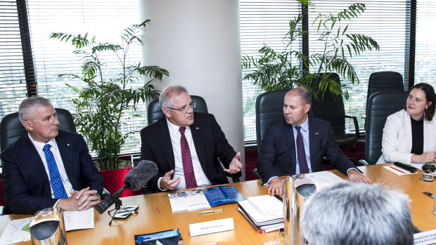 Deputy Prime Minister Michael McCormack, Prime Minister Scott Morrison and Treasurer Josh Frydenberg during a cabinet meeting at the Parliamentary Offices in Brisbane.