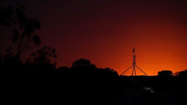 A dramatic sunrise sweeps over Canberra ahead of a dramatic day in national politics. 