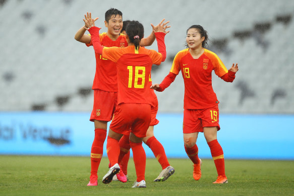 Li Ying celebrates after one of China's early goals against Thailand on Friday.