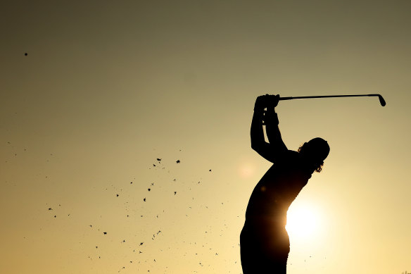 Cameron Smith of Australia plays a shot on the practice range prior to the Australian Open at The Lakes in Sydney