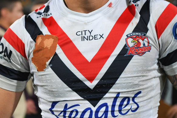 NRL players covered up the league’s logo for round 22 in protest over the pay dispute.