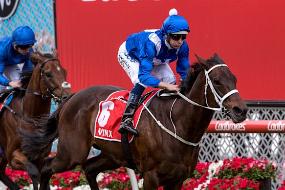 Winx and jockey Hugh Bowman winning the 2018 Cox Plate at Moonee Valley.