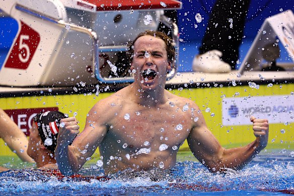 Sam Short celebrates after winning gold in the opening race of the 2023 world championships in the men’s 400m freestyle.