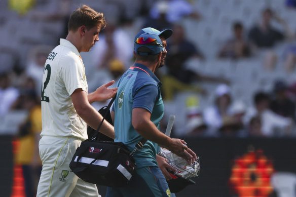Australia’s Cameron Green walks from the field after injuring his finger.