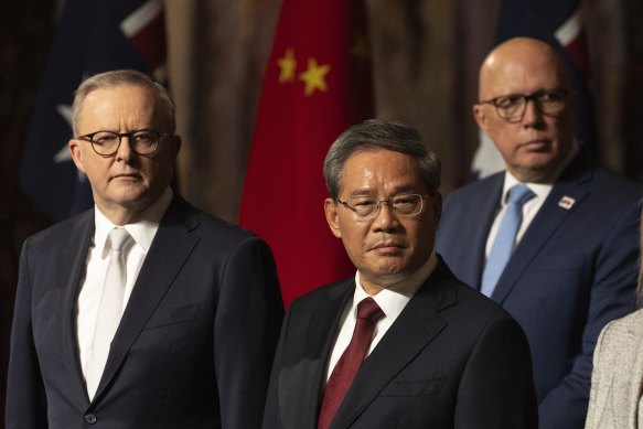Anthony Albanese and Peter Dutton with Chinese Premier Li Qiang at Parliament House on Monday.