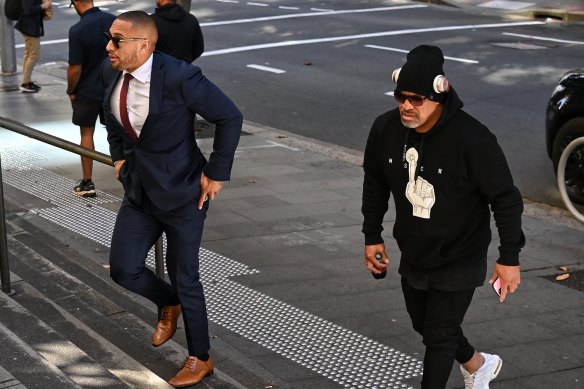Jamil Hopoate (left) with his father John Hopoate outside Downing Centre Local Court in April last year.