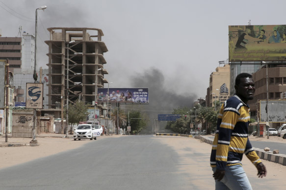Smoke is seen rising from a neighbourhood in Khartoum on Saturday.