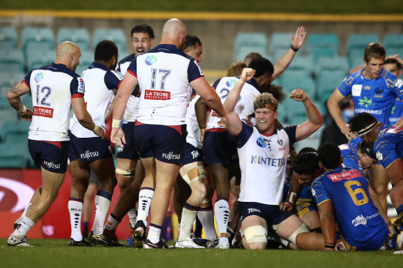 Rebels players celebrate in their dramatic win over the Western Force at Leichhardt Oval.