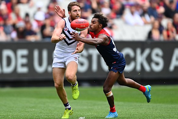 Former AFL player Reece Conca (left) was the picture of health when he started trying to have a baby with his wife, Isabelle. He was devastated when he discovered he was infertile.