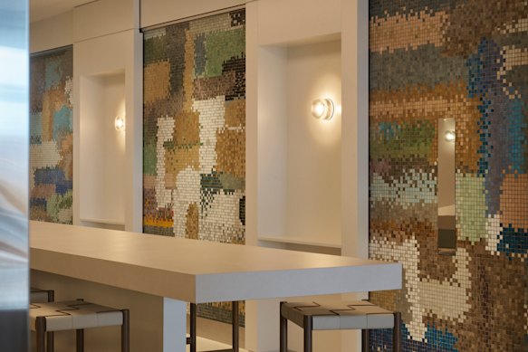 Some of the original mosaic abstract tile work by Michael Santry was rescued and repurposed at 33 Alfred Street, Sydney. 