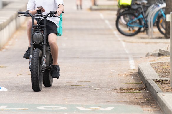 A man riding an e-bike was critically injured after crashing into a pole while allegedly fleeing police.