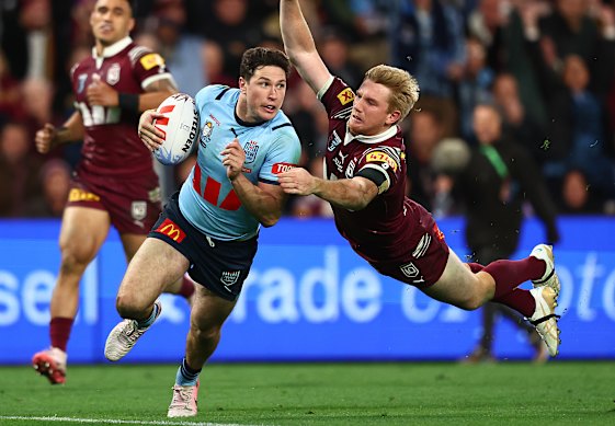 Mitchell Moses shrugs off Tom Dearden to score the series winning try for NSW last year.
