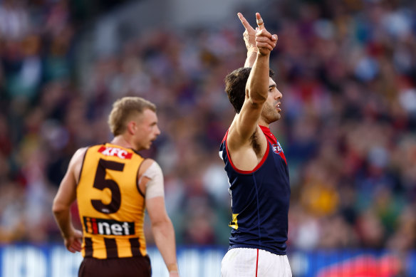 Christian Petracca celebrates a goal.