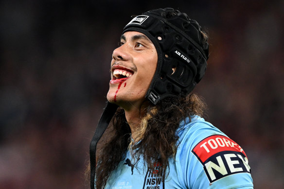 Jarome Luai smiles at the Queensland fans after getting his marching orders at Suncorp Stadium last year.