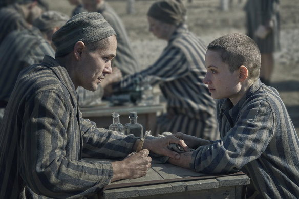 Jonah Hauer-King and Anna Próchniak as Lali and Gita in The Tattooist of Auschwitz.