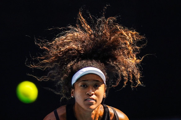 Naomi Osaka practices at Melbourne Park on Saturday ahead of defending her Australian Open title.