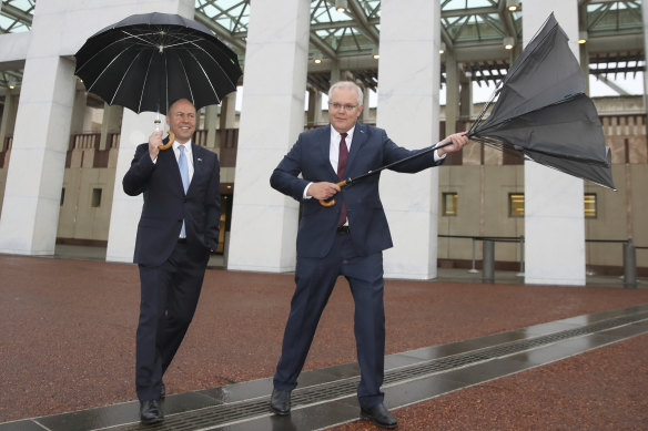 Treasurer Josh Frydenberg and Prime Minister Scott Morrison after delivering the budget in October. 