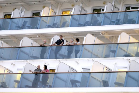 Passengers onboard the Caribbean Princess in Florida, in the United States, in March.