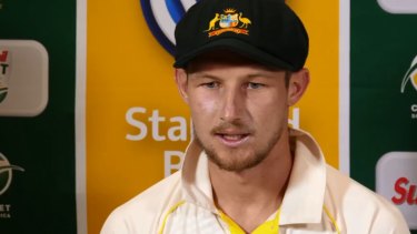 Facing up: Cameron Bancroft faces the media after being charged with changing the condition of the ball.