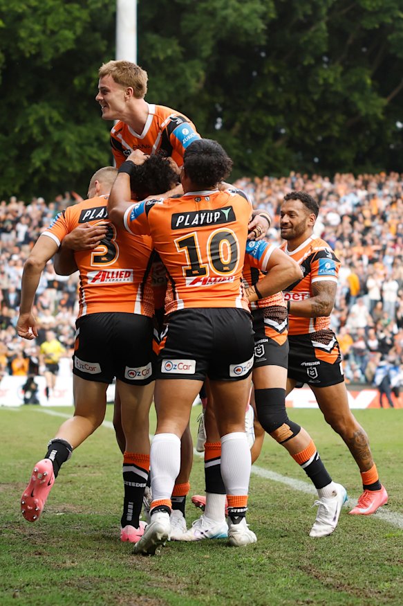 Galvin (top) celebrates with teammates after Samuela Fainu’s try.