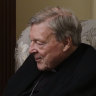 Cardinal George Pell answers a question during an interview with the Associated Press inside his residence near the Vatican in Rome in November.