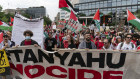 Demonstrators march outside the US Capitol as they protest the visit of Israeli Prime Minister Benjamin Netanyahu. 