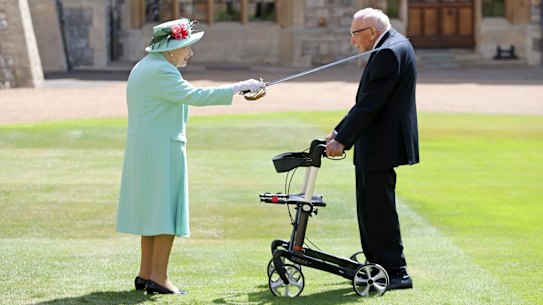 Queen Elizabeth II knights Captain Thomas Moore.