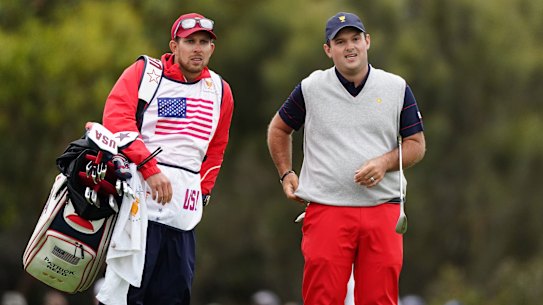 American Patrick Reed (right) with his caddie Kessler Karain at the Presidents Cup.
