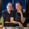 Partners in business and life, J. Y. Lee (left) and Thi Le.
