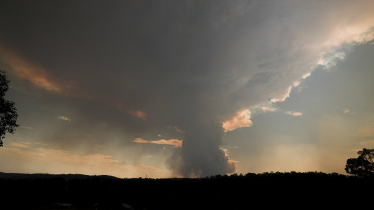 Plume from a bushfire seen northwest of Bruthen in East Gippsland, on Monday 30 December 2019. bushfirefedpol Photo: Alex Ellinghausen